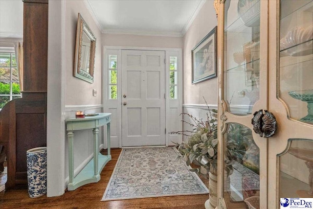 965 Scriven Dr, Flornce, SC 29501 - entryway featuring ornamental molding, wood finished floors, and a wainscoted wall