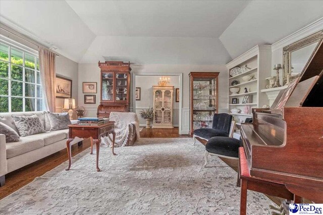 965 Scriven Dr, Flornce, SC 29501 - living area with vaulted ceiling and wood finished floors