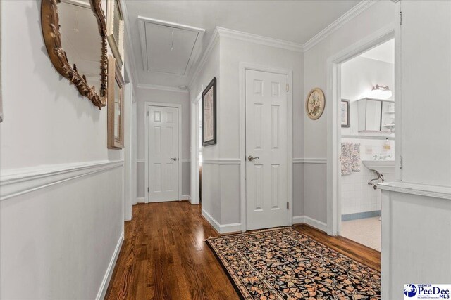 965 Scriven Dr, Flornce, SC 29501 - hall with attic access, wood finished floors, crown molding, and baseboards