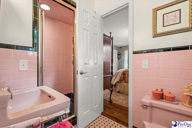 965 Scriven Dr, Flornce, SC 29501 - ensuite bathroom with tile walls and a sink