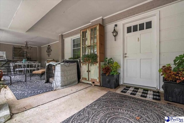 965 Scriven Dr, Flornce, SC 29501 - doorway to property featuring outdoor dining area