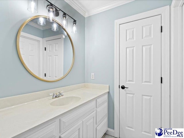 bathroom featuring ornamental molding and vanity