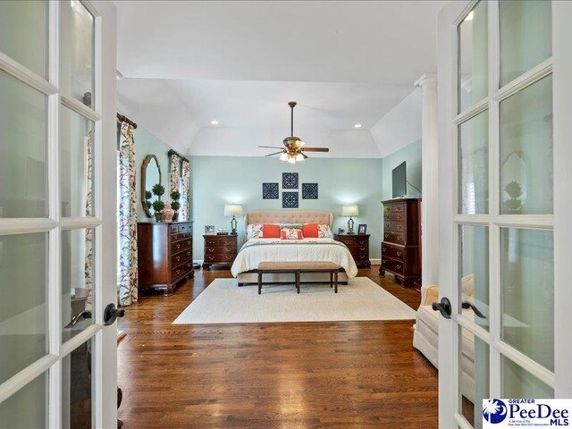 bedroom with vaulted ceiling, french doors, wood finished floors, and recessed lighting