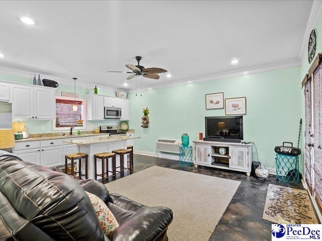 living area with baseboards, a ceiling fan, crown molding, concrete floors, and recessed lighting