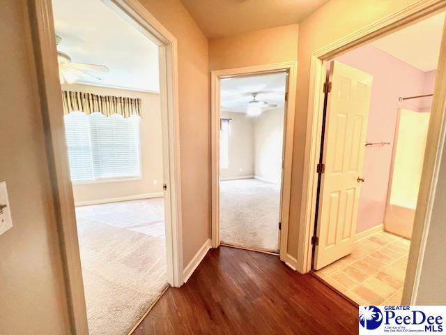 3014 Longfellow Dr, Florence, SC 29505 - corridor featuring wood-type flooring