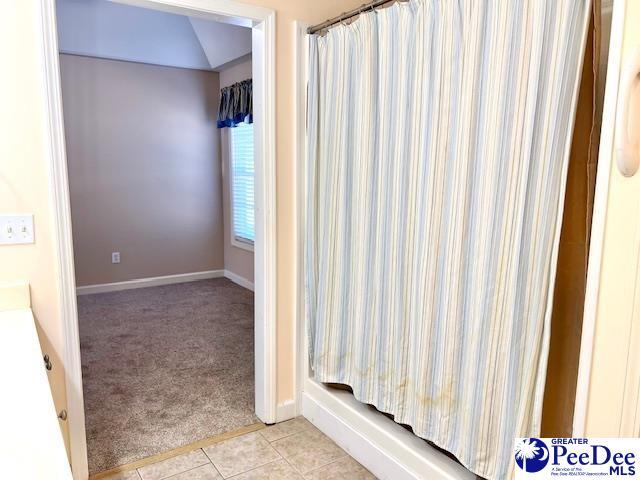 3014 Longfellow Dr, Florence, SC 29505 - bathroom with tile patterned floors