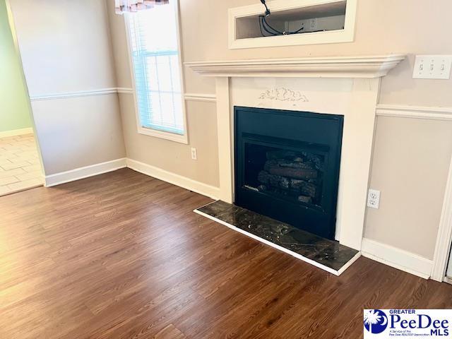 3014 Longfellow Dr, Florence, SC 29505 - interior details with hardwood / wood-style flooring