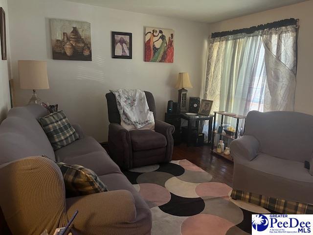 living room with hardwood / wood-style flooring