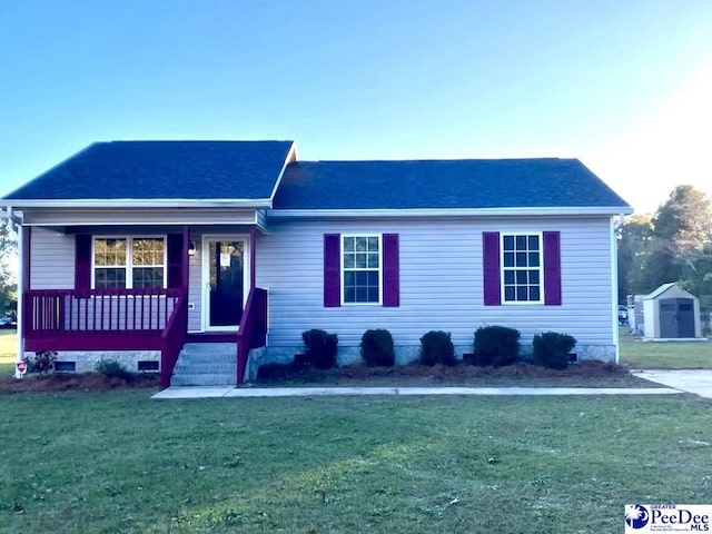 view of front facade with a porch and a front lawn