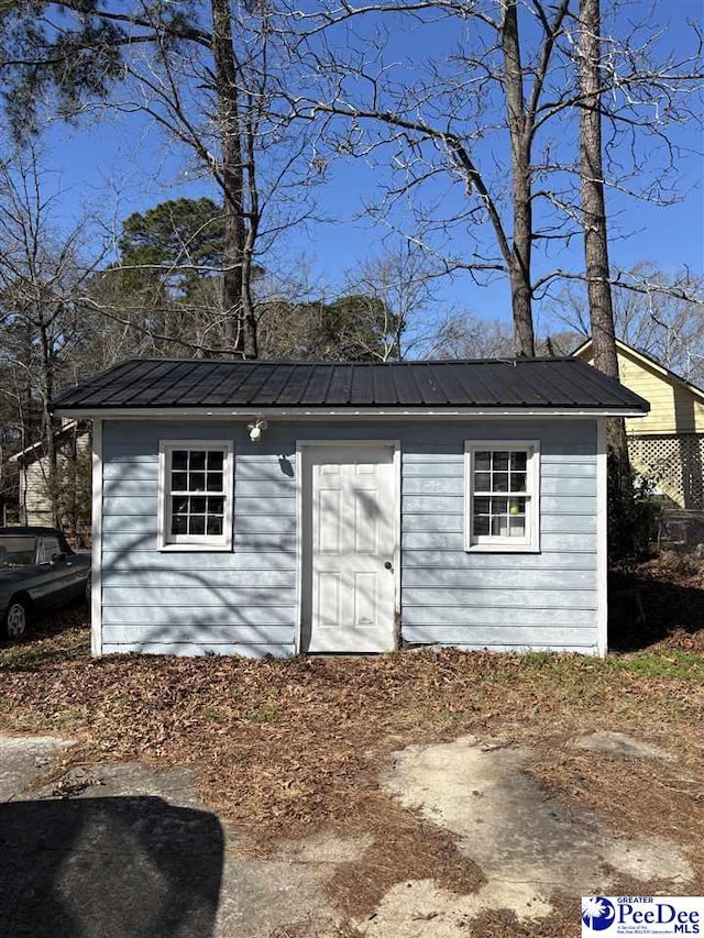 view of outbuilding with an outdoor structure