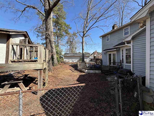 view of yard with a deck