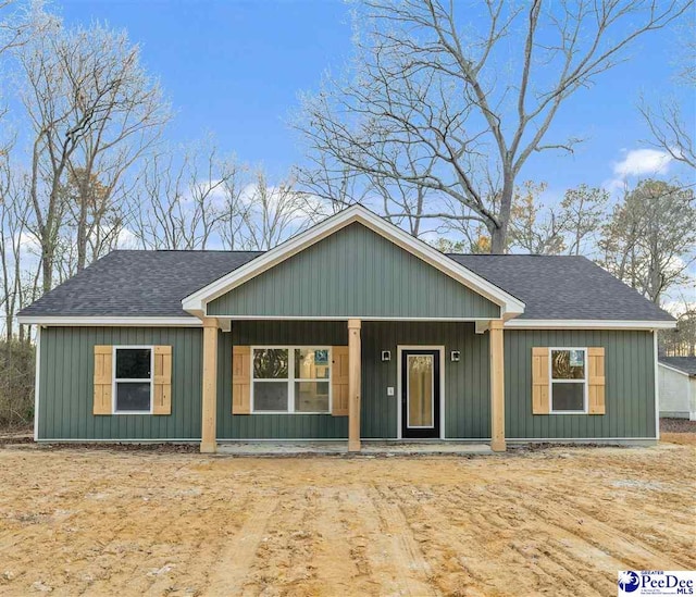 view of front of property featuring covered porch