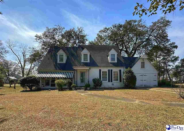 408 E Jackson St, Dillon, SC 29536 - new england style home with a front yard