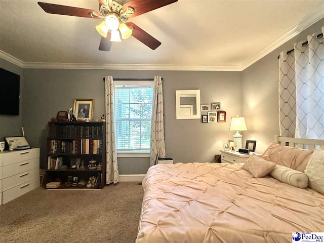 carpeted bedroom with ornamental molding and ceiling fan