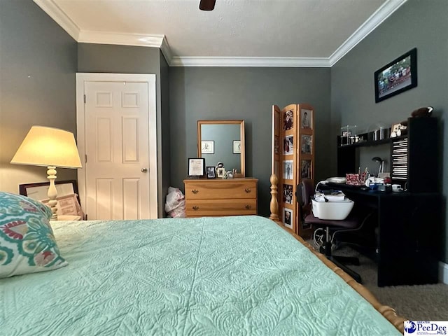 bedroom with ornamental molding and ceiling fan