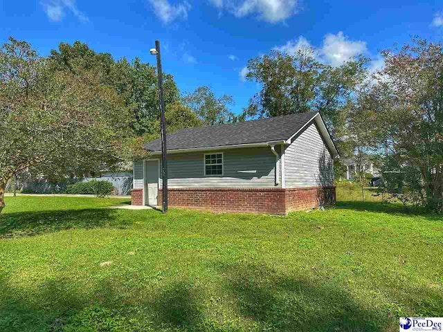 view of property exterior featuring a yard