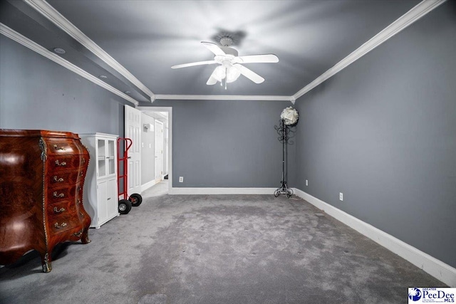 interior space featuring crown molding, carpet flooring, and ceiling fan