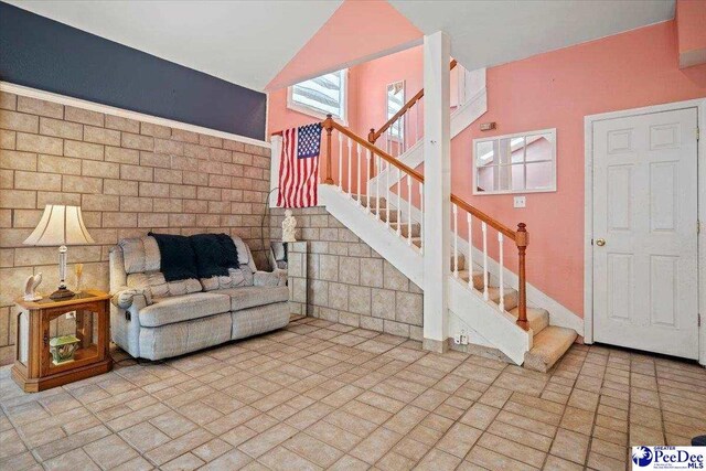 living room with vaulted ceiling