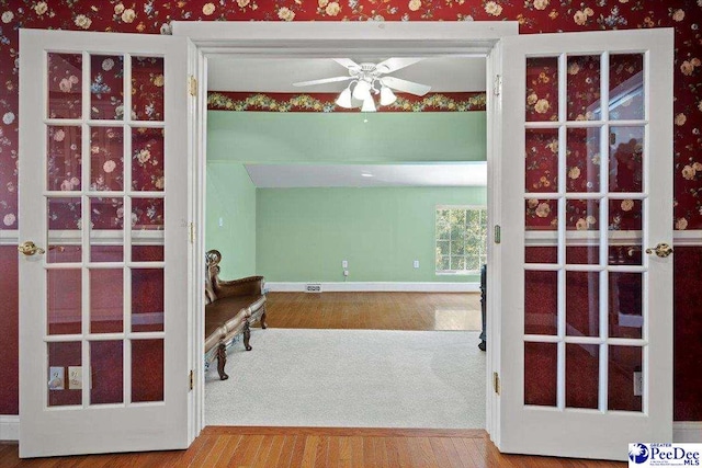 interior space featuring ceiling fan and hardwood / wood-style floors