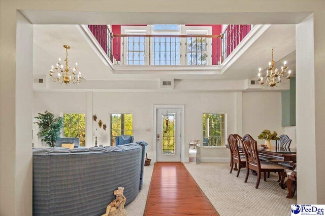 reception area featuring a chandelier