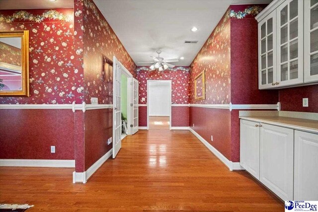 hall featuring light hardwood / wood-style flooring