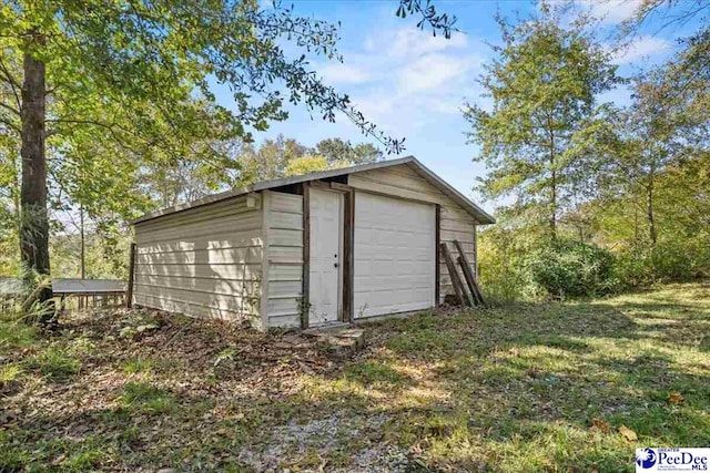 view of outdoor structure featuring a garage