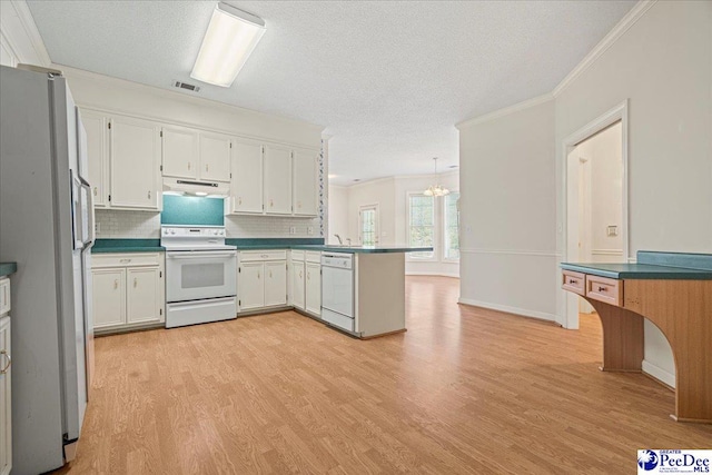 kitchen with white appliances, light wood-style flooring, under cabinet range hood, and white cabinetry