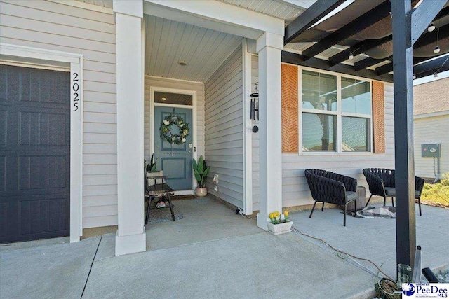 2025 Eastpark Dr, Darlington, SC 29532 - view of exterior entry with a garage and covered porch