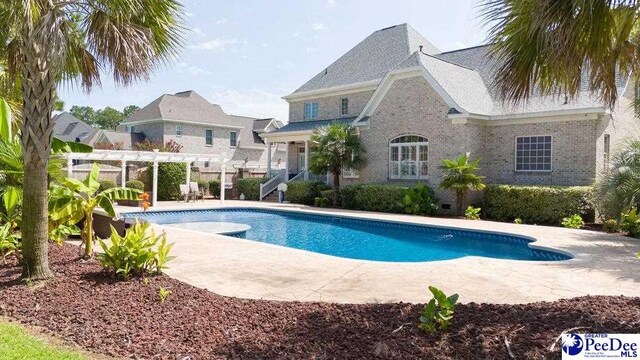1311 Queens Ferry Rd, Florence, SC 29505 - outdoor pool with a pergola and a patio area