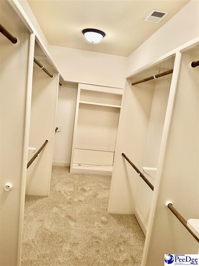 1311 Queens Ferry Rd, Florence, SC 29505 - spacious closet featuring carpet flooring