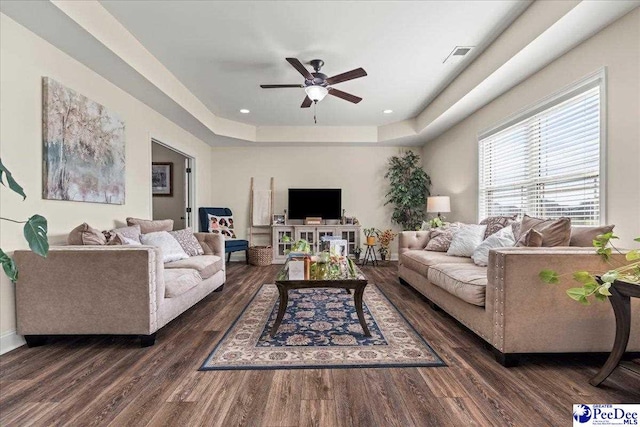 1814 Lake Blalock Dr, Florence, SC 29506 - living room with a ceiling fan, dark wood-style flooring, and a raised ceiling