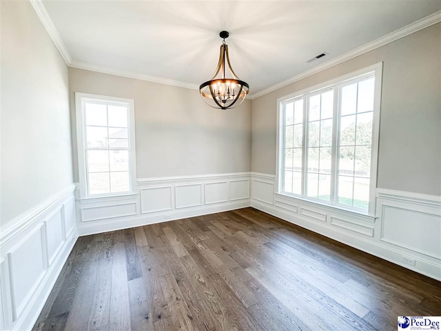 unfurnished dining area featuring a wealth of natural light, visible vents, dark wood finished floors, and a notable chandelier