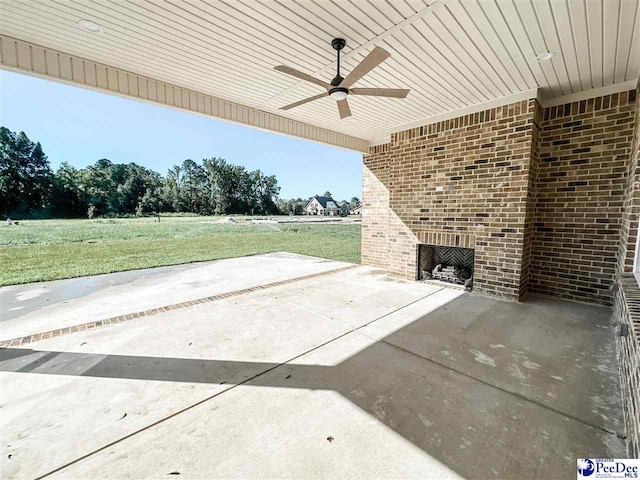 view of patio / terrace featuring ceiling fan