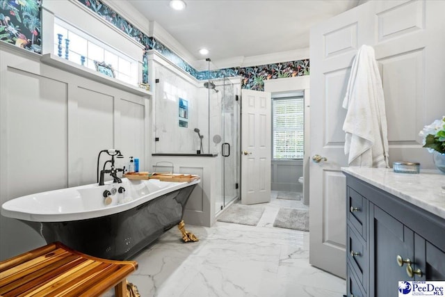 full bathroom featuring vanity, toilet, and independent shower and bath