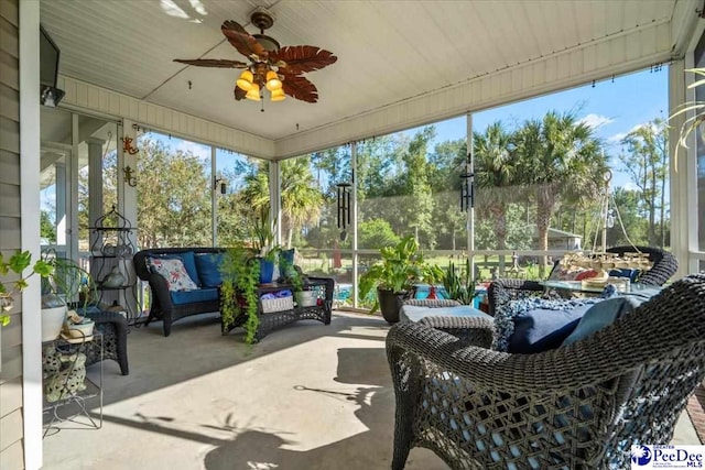 sunroom / solarium with ceiling fan