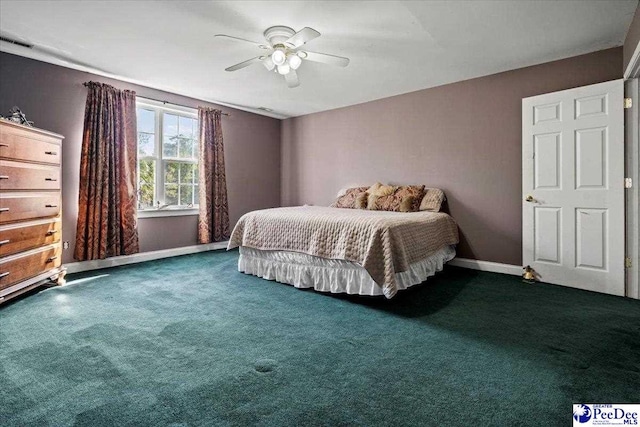 carpeted bedroom with ceiling fan