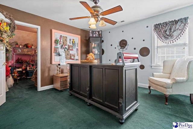 bar featuring dark colored carpet and ceiling fan