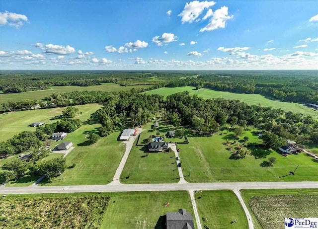 birds eye view of property featuring a rural view