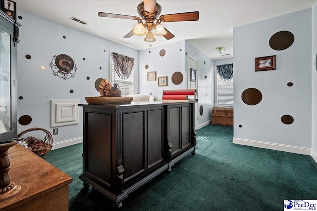 carpeted bedroom featuring multiple windows