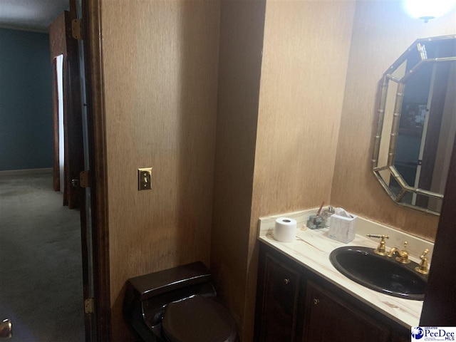 half bathroom with vanity