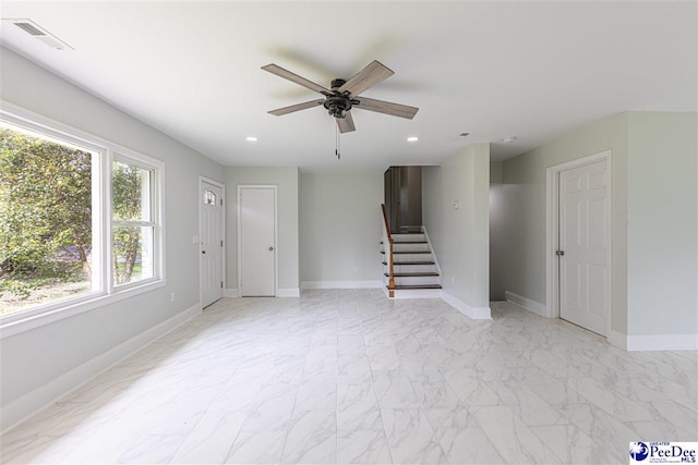 interior space featuring stairway, visible vents, baseboards, recessed lighting, and a ceiling fan