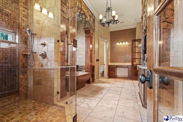 bathroom with crown molding, toilet, a shower with shower door, and a notable chandelier