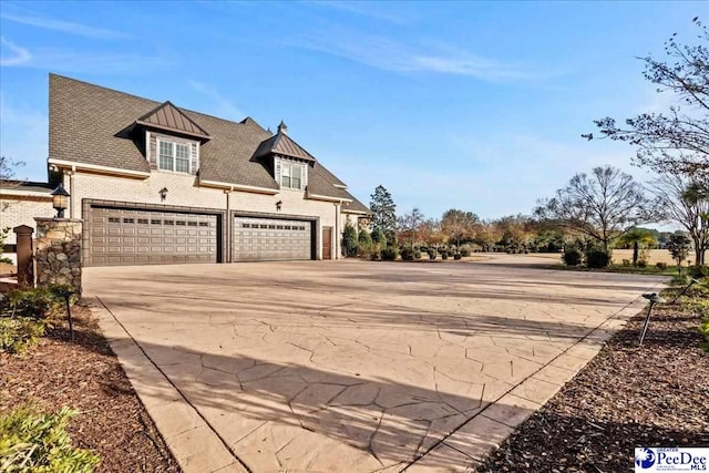 exterior space with a garage