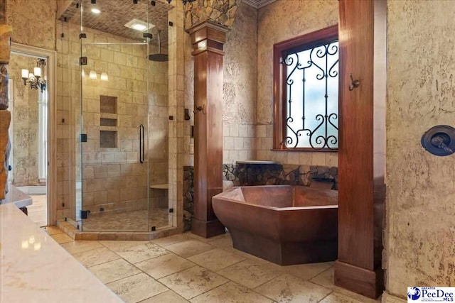 bathroom with shower with separate bathtub