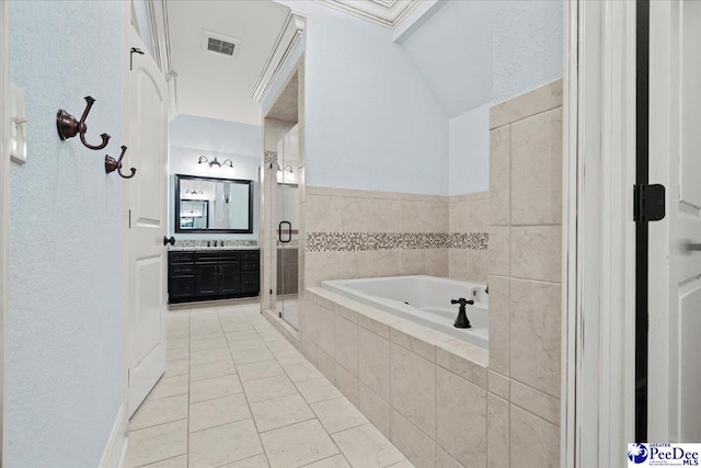 bathroom with independent shower and bath, vanity, vaulted ceiling, and tile patterned floors