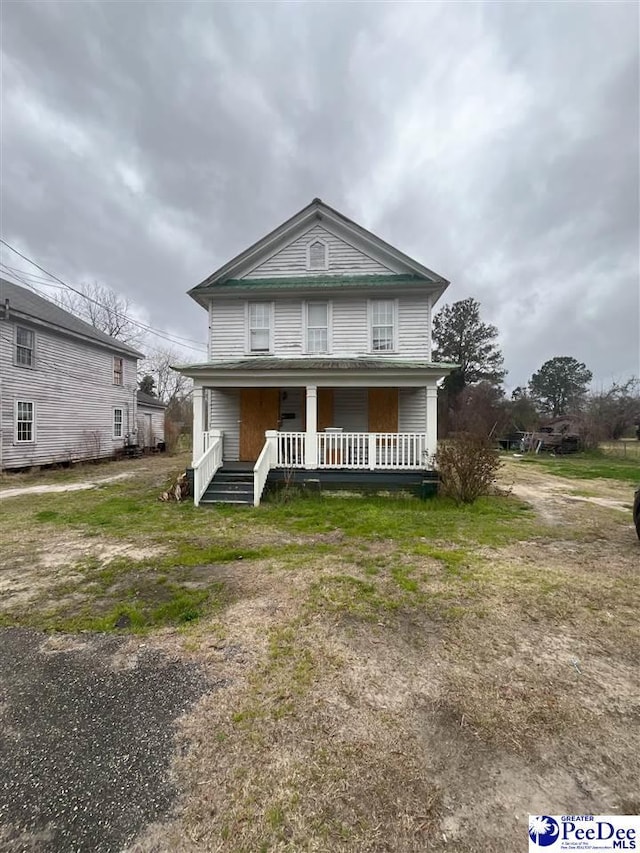 view of front of property with a porch