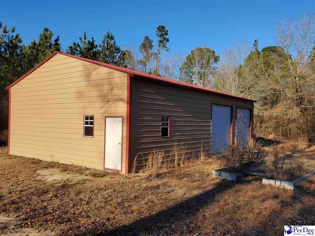 view of outdoor structure featuring a garage