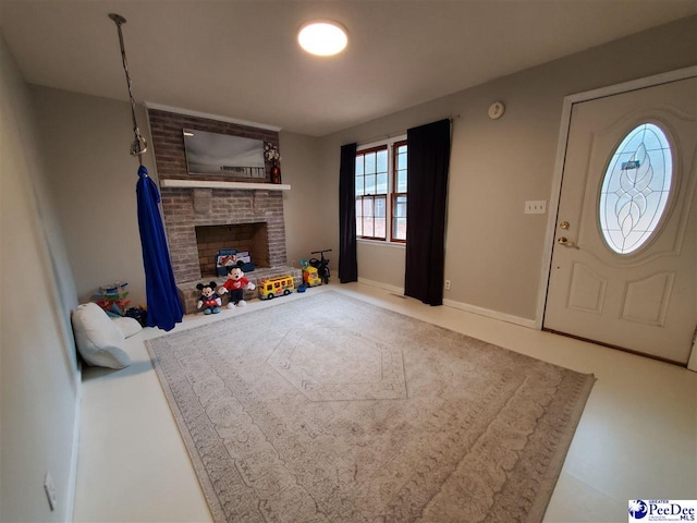 entrance foyer featuring a fireplace