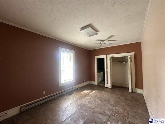 unfurnished bedroom with ceiling fan, baseboard heating, ornamental molding, a textured ceiling, and a closet