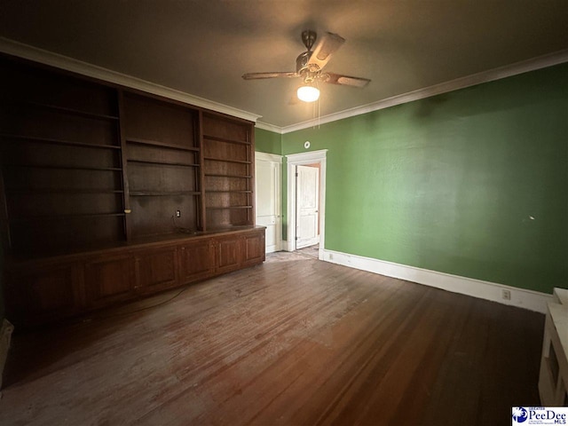 unfurnished bedroom featuring wood-type flooring, ornamental molding, and ceiling fan